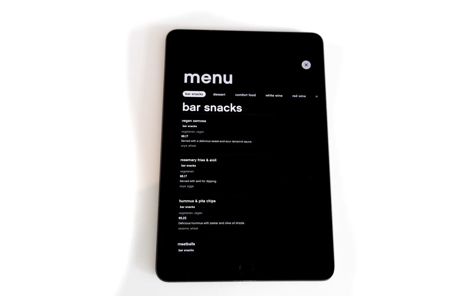 A digital restaurant menu open on a tablet